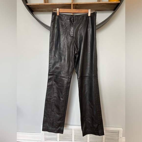Danier Pants - DANIER vintage black leather pants with studded details along sides size 6 small